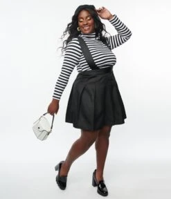 Unique Vintage Plus Size 1950s Black Pleated Suspender Mini Skirt