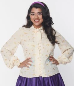 Willy Wonka X Unique Vintage Cream & Gold Neck Tie Blouse Glitter Wonka Print -New Dress Store willy wonka x unique vintage cream gold neck tie blouse glitter wonka print 675957